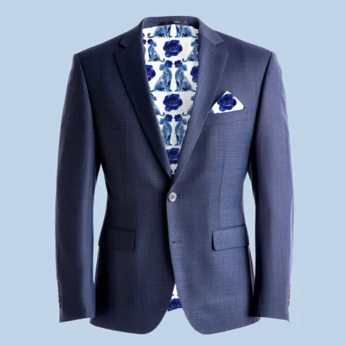 Elegant navy blue suit jacket with pink lining and pocket square